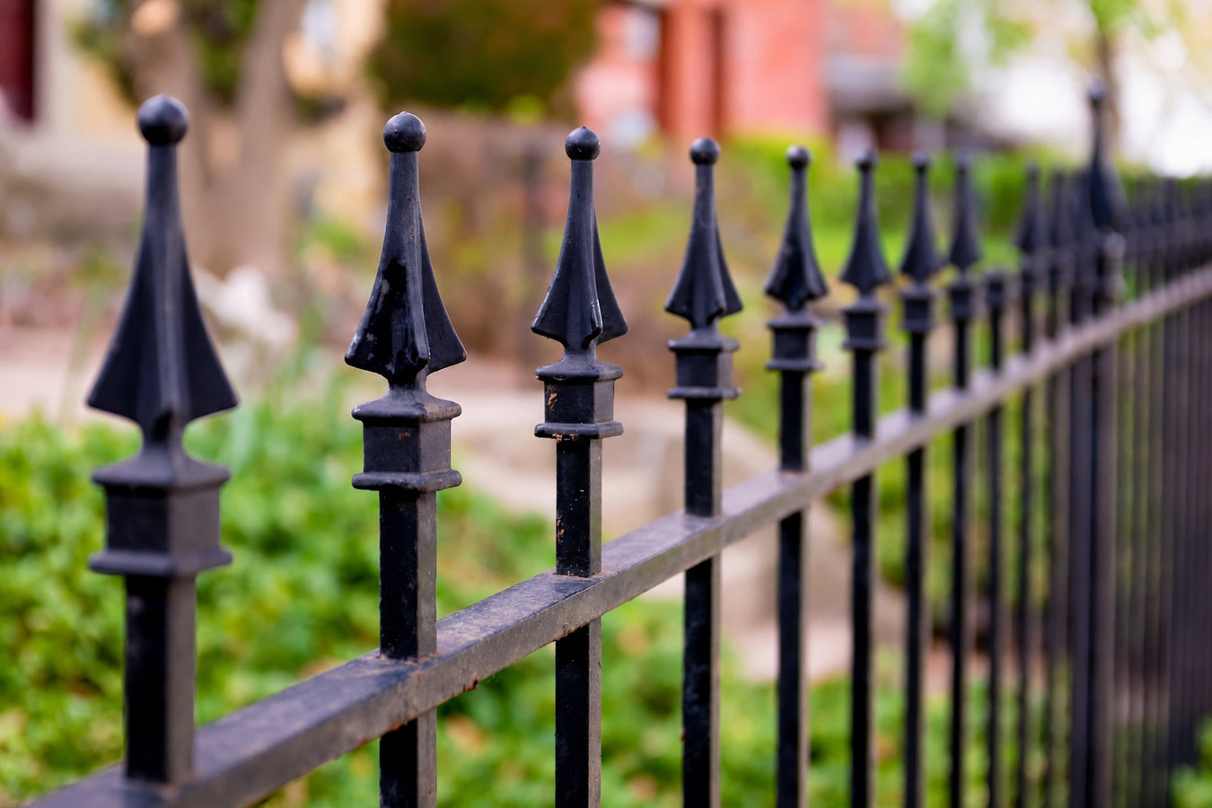 Ornamental iron fence installation